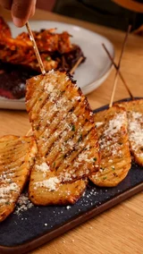 Garlic-Parmesan Crosshatch Potato Sticks Surf And Turf Recipe by Tasty