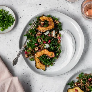 Farro Salad With Acorn Squash, Kale, + Pomegranate